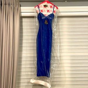 Tight bright blue dress with cutout
